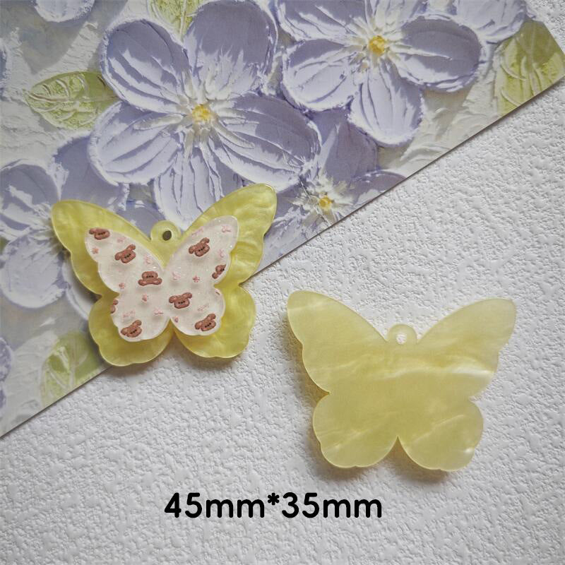 Wholesale 10pcs Water Pattern Double Butterfly Cute Cartoon Hole Pendant Embossed Printing Design Acrylic Jewelry Accessories DIY